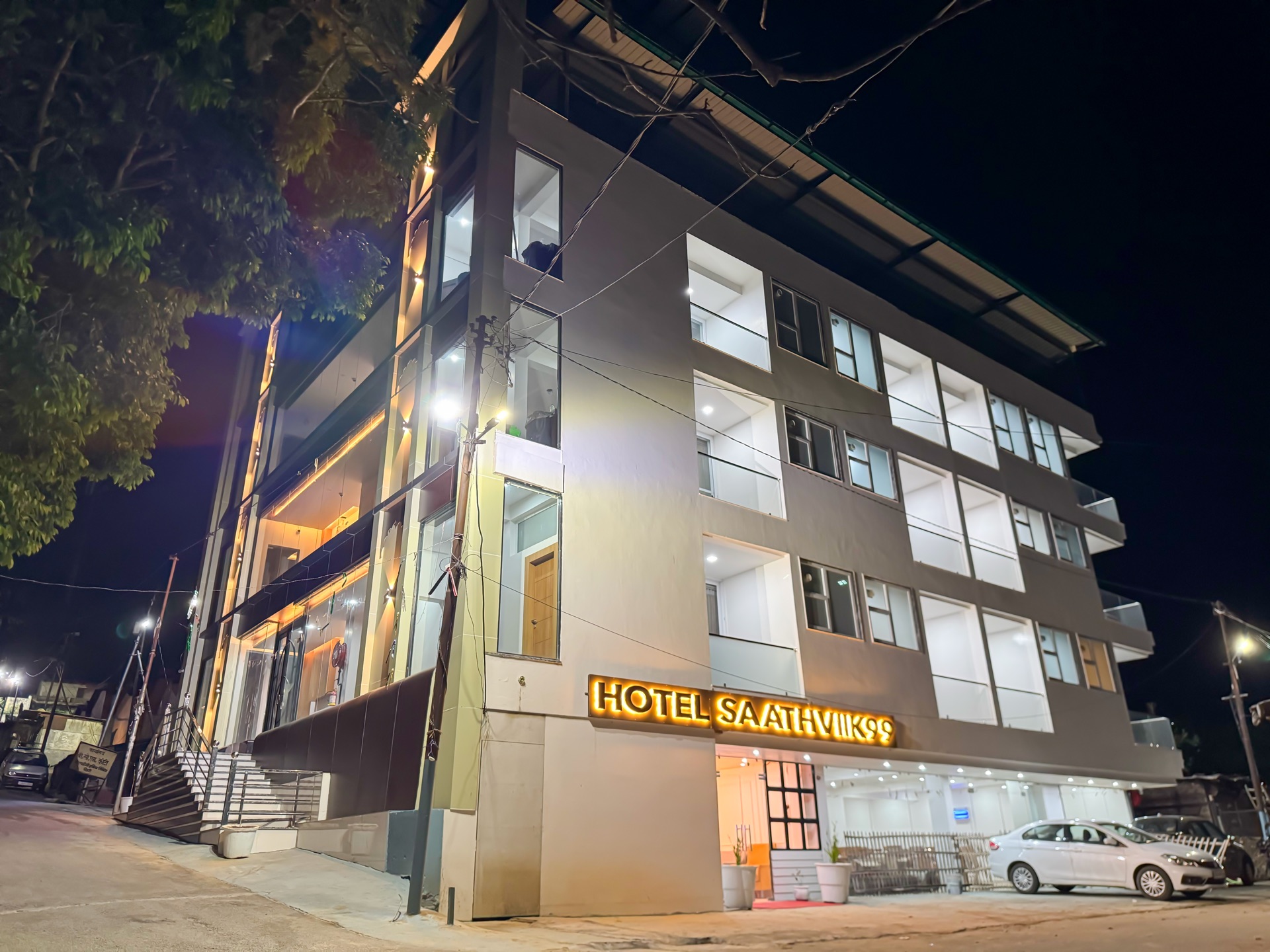 Hotel Saathviik99 exterior at night